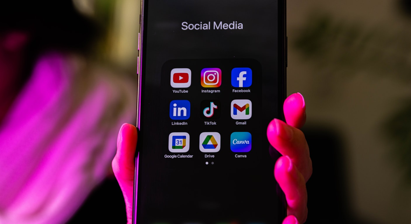 A smartphone home screen displaying a grid of mobile app icons.
